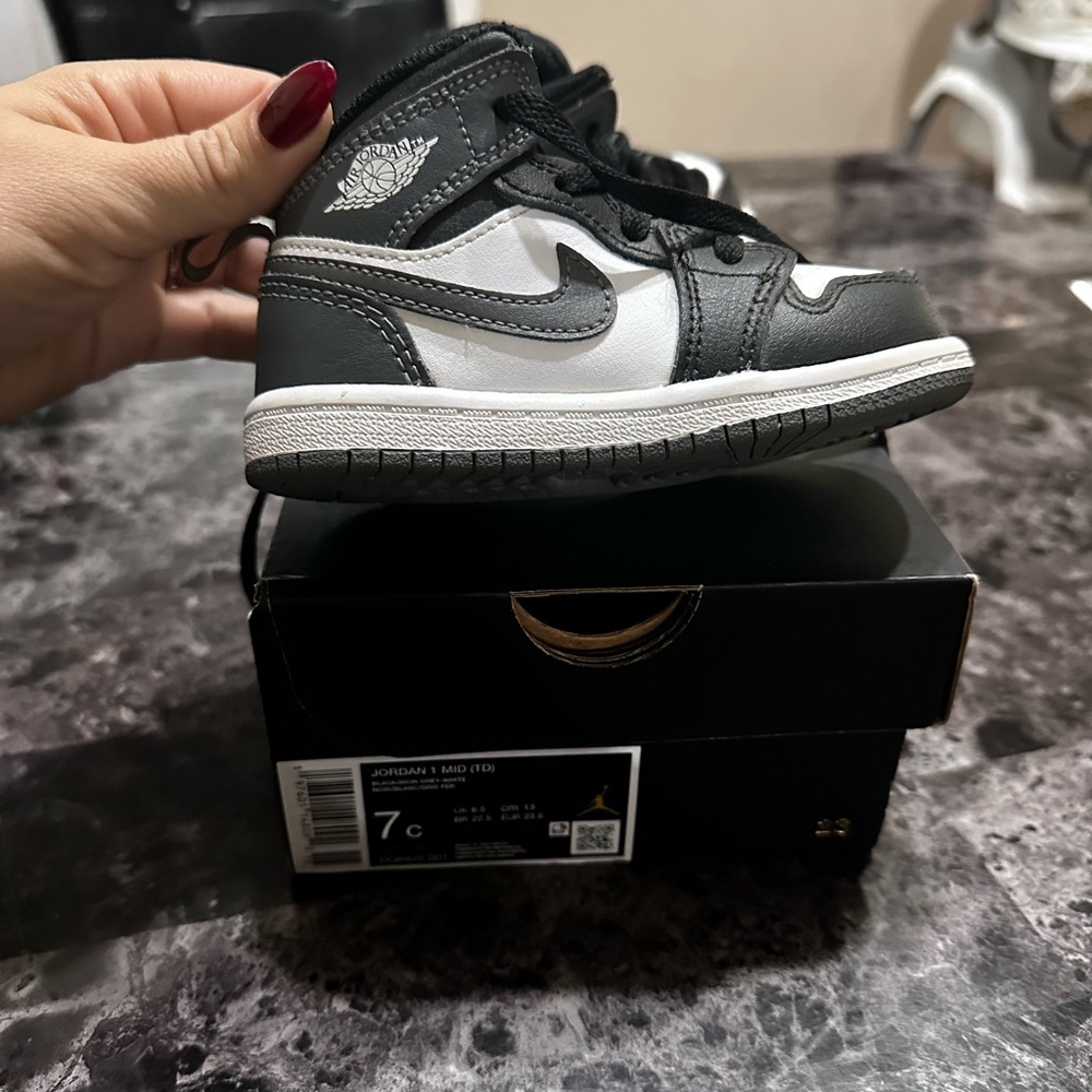 Jordan Kids' Black and White High-Top Sneakers